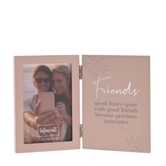 The pink hinged wooden photo frame showcases a portrait aperture on one side and a heartfelt ‘Friends’ verse on the other.